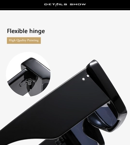 Detail view of the flexible metal hinges and high quality glossy finish on black sunglasses