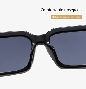 Detail of comfortable ergonomic nose pads on oversized black square frame sunglasses
