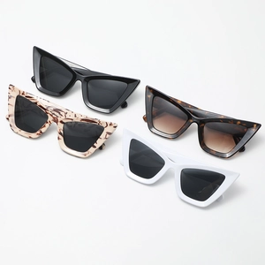 Lunettes de soleil œil de chat en quatre couleurs avec monture en résine brillante