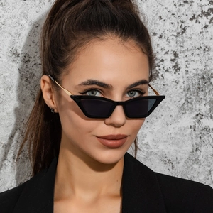 Vintage black cat eye metal sunglasses for women with retro stylish frame and gold temple