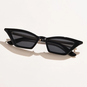 Retro black cat-eye metal sunglasses with dark lenses for a stylish vintage street look