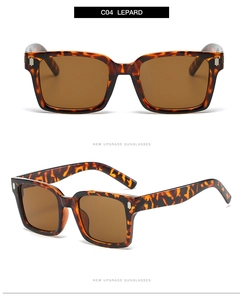 Close-up of retro square leopard pattern sunglasses with stylish metal rivets and brown lenses