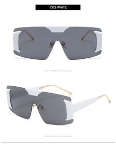 Detail of white shield sunglasses with gradient lenses and slim golden metal temples