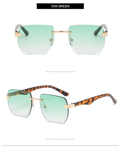 Detail of rimless square sunglasses with green gradient lenses and tortoiseshell temples