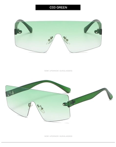 Detail view of green gradient rimless sunglasses with metal nose pads and sleek temples