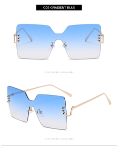 Macro detail of rimless square sunglasses with blue gradient lenses and gold metal frames