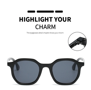 Detailed view of durable metal hinges on classic black polygon retro sunglasses