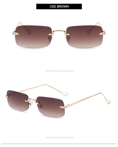 Detail of brown gradient lenses and gold hollow metal temples on small square sunglasses