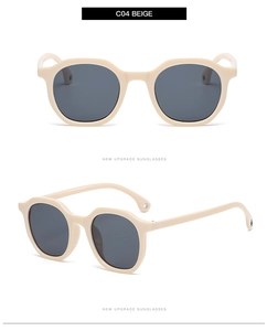 Detail view of C04 Beige retro polygon sunglasses with premium grey tinted lenses