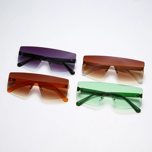 Frameless rimless sunglasses for men and women with gradient lenses in four colors
