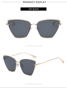 Detailansicht der goldenen Metall-Katzenaugen-Sonnenbrille mit schwarzen Gläsern