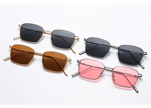 Top view of retro square metal sunglasses in gold and silver frames with colored lenses