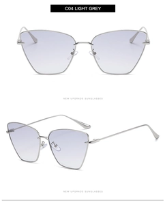 Detailsicht der Cat-Eye-Sonnenbrille mit silbernem Metallrahmen und grauen Verlaufsgläsern