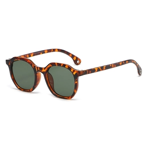 Retro small frame polygonal tortoiseshell sunglasses with dark green lenses and metal tips