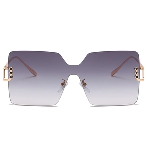 Modern oversized square sunglasses with purple-grey gradient lenses and gold metal temples