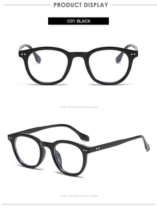 Front and side view of black round retro glasses frames with metallic rivet details