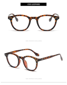 Detail view of leopard print round glasses frame with silver hinge metal stud accents