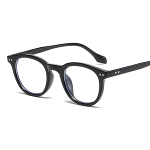 Classic round black eyeglasses frame with metal rivet accents on a white background