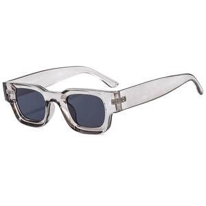 Modern square frame sunglasses with light gray transparent plastic and dark lenses