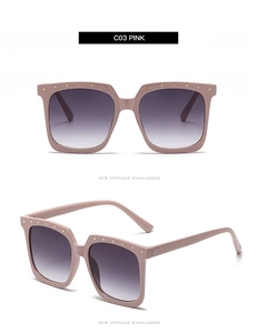 Detail of C03 pink square sunglasses with gold stud accents and gradient lenses