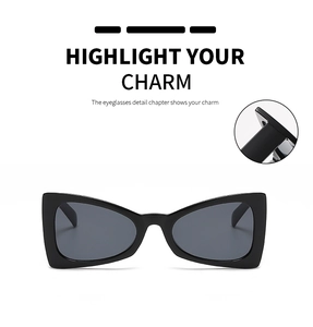Detail of metal hinge structure on black triangular cat eye sunglasses for women