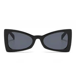 Fashionable black triangle cat eye sunglasses with thick frames and dark grey lenses