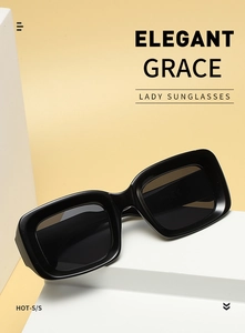 Detail of square black sunglasses showing CE mark on temple over geometric background