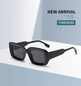Detail of square black sunglasses temple showing CAT.3 UV protection category marking