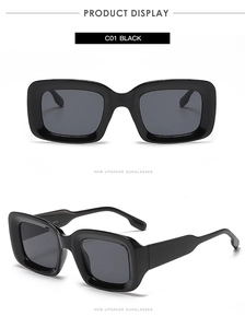 Detail view of black square sunglasses showing the C01 Black model and CAT.3 lens label