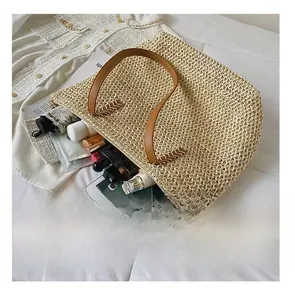Large capacity straw tote bag showing tablet, umbrella, and cosmetics inside for storage