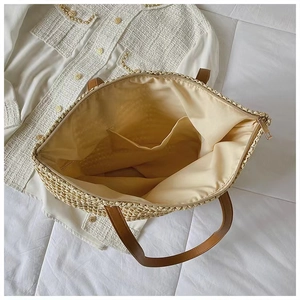 Top view of woven tote bag with smooth inner lining and zipper pocket for summer beach