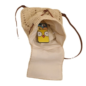 Hollow straw shoulder bag with beige paper rope weave and drawstring canvas lining