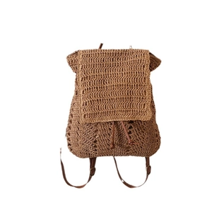 Hollow straw backpack for women with drawstring flap closure and adjustable straps