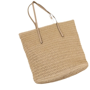 Minimalist large capacity straw tote bag with brown shoulder straps for beach vacation