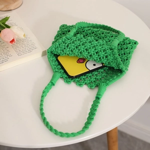 Grass green hollow crochet cotton rope beach bag with comfortable woven top handle