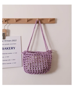 Detail of lavender woven mesh tote bag with cotton ropes and a white drawstring liner