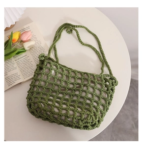 Detailed honeycomb mesh knit of the green handmade cotton woven shoulder beach bag