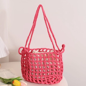 Magenta crochet tote bag with hollow mesh pattern and drawstring liner for beach holidays