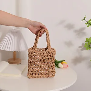 Handmade crochet woven tote bag with openwork design for summer beach vacation