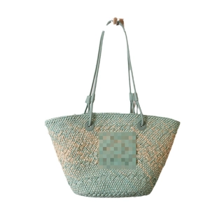 Large woven straw tote bag with mint green gradient design for beach vacation and travel