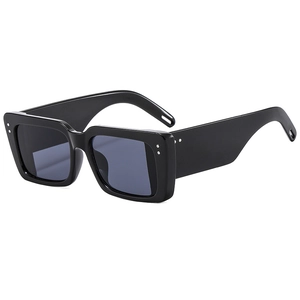 Chic black oversized square sunglasses with stylish silver rivets and dark grey lenses