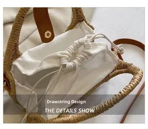 Close-up of woven straw bag featuring drawstring canvas lining and magnetic leather closure