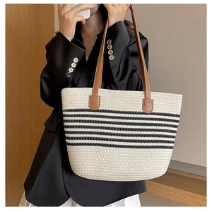Detailed view of the striped cotton woven tote bag with premium brown leather straps