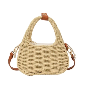 Straw crossbody bag with top handle and adjustable leather strap for beach vacation