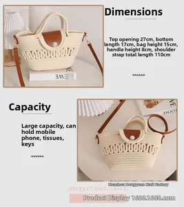 Detail view of woven crossbody bag with pearl buckle showing 27cm width and 15cm height