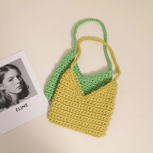 Handmade crochet cotton shoulder bag in yellow and green with woven texture