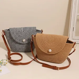 Chic woven crossbody bucket bags with pearl buckle and brown leather strap for women