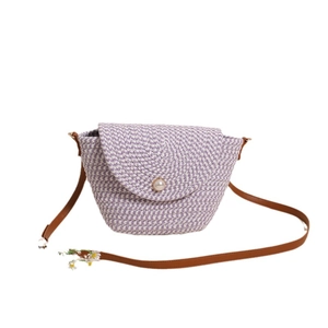Handwoven purple and white shell crossbody bag with pearl clasp and leather strap