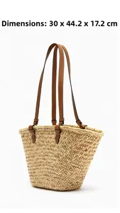 Detail view of woven straw tote bag with size dimensions 30 x 44.2 x 17.2 cm