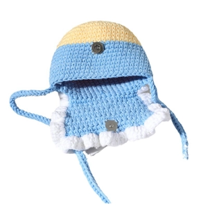 Handmade crochet baby earflap hat with light blue and yellow contrast knit patterns